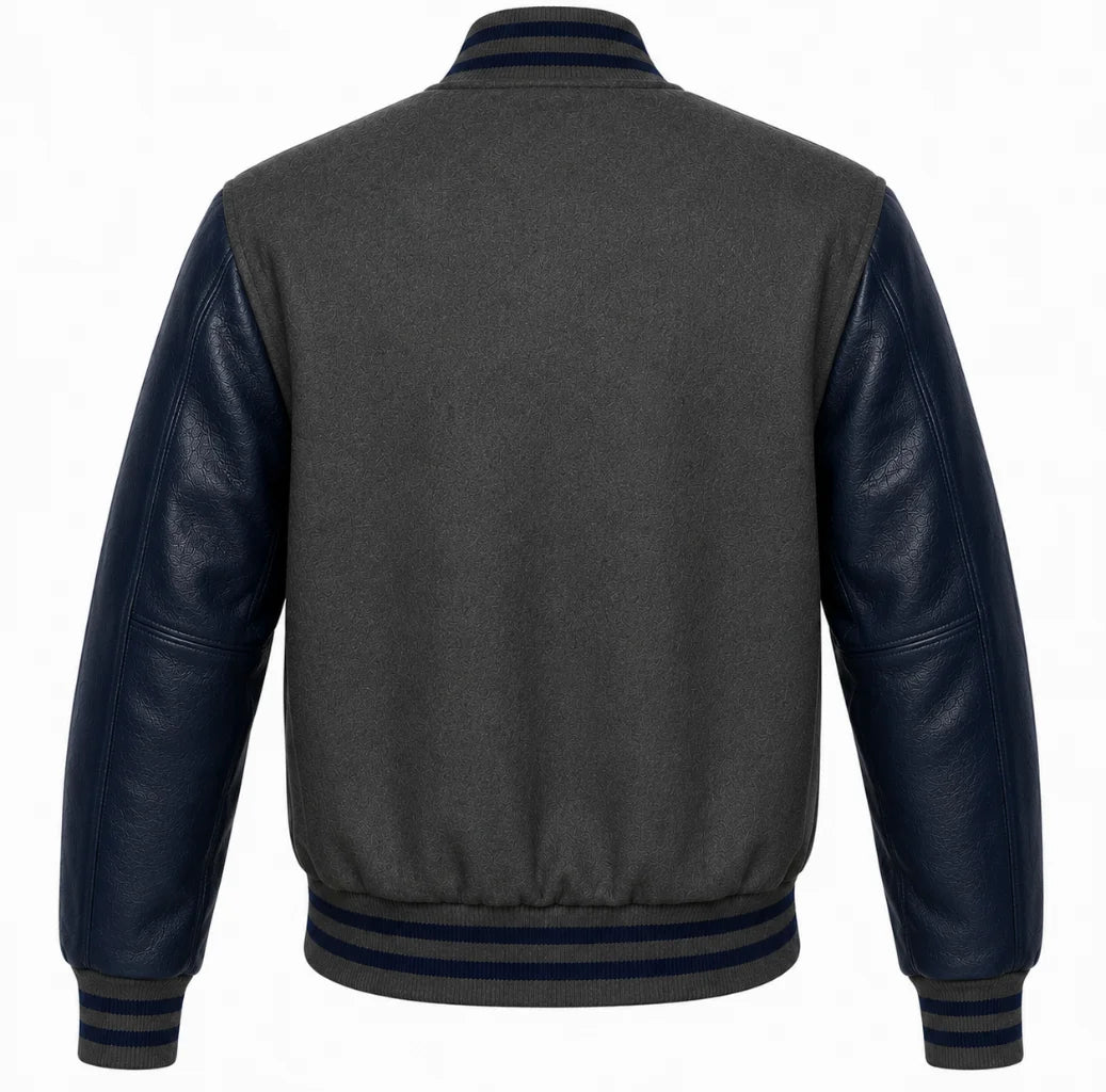 Charcoal grey wool varsity jacket with navy blue cowhide sleeves, back view
