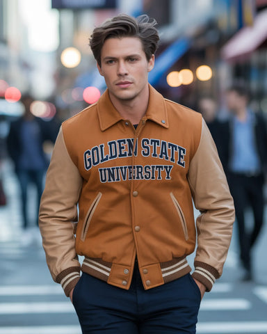 Man wearing a 'Golden State University' jacket on a city street.