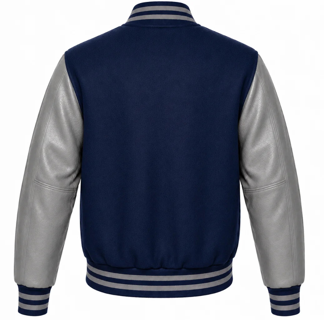 Indigo wool varsity jacket with grey leather sleeves, back view