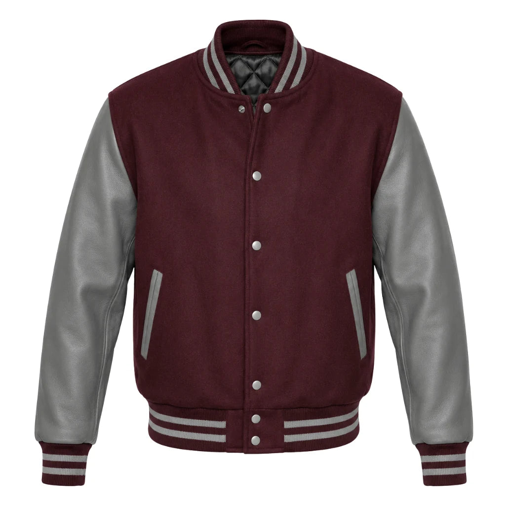 A varsity-style jacket with a maroon body and grey sleeves, featuring gray striped ribbed collar, cuffs, and hem, and silver snap buttons.