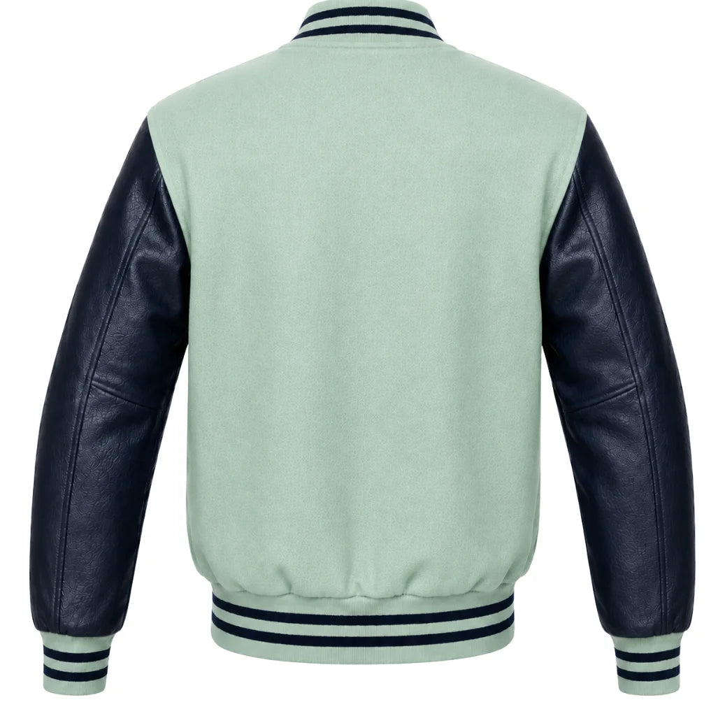 Mint green wool varsity jacket, navy blue leather sleeves, back view